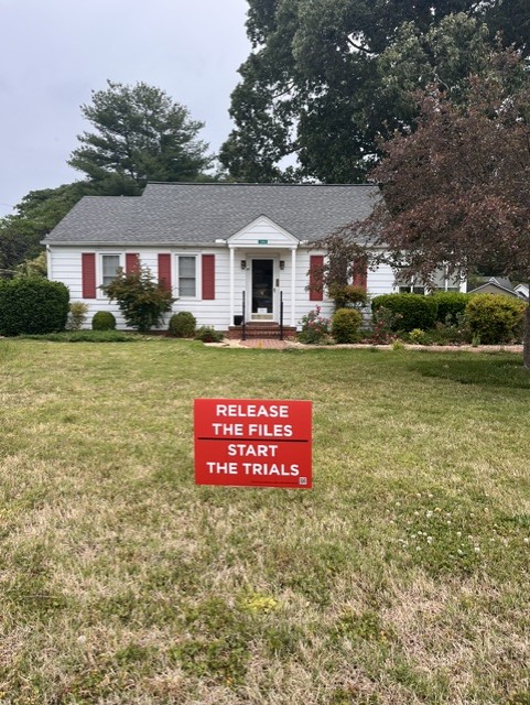 Release the Files — yard sign in front yard